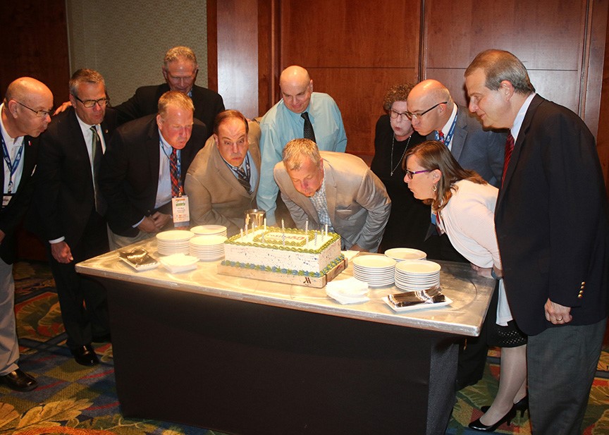 2016-17 president Andy Seeley and all the past presidents in attendance celebrated CoSIDA's 60th birthday.